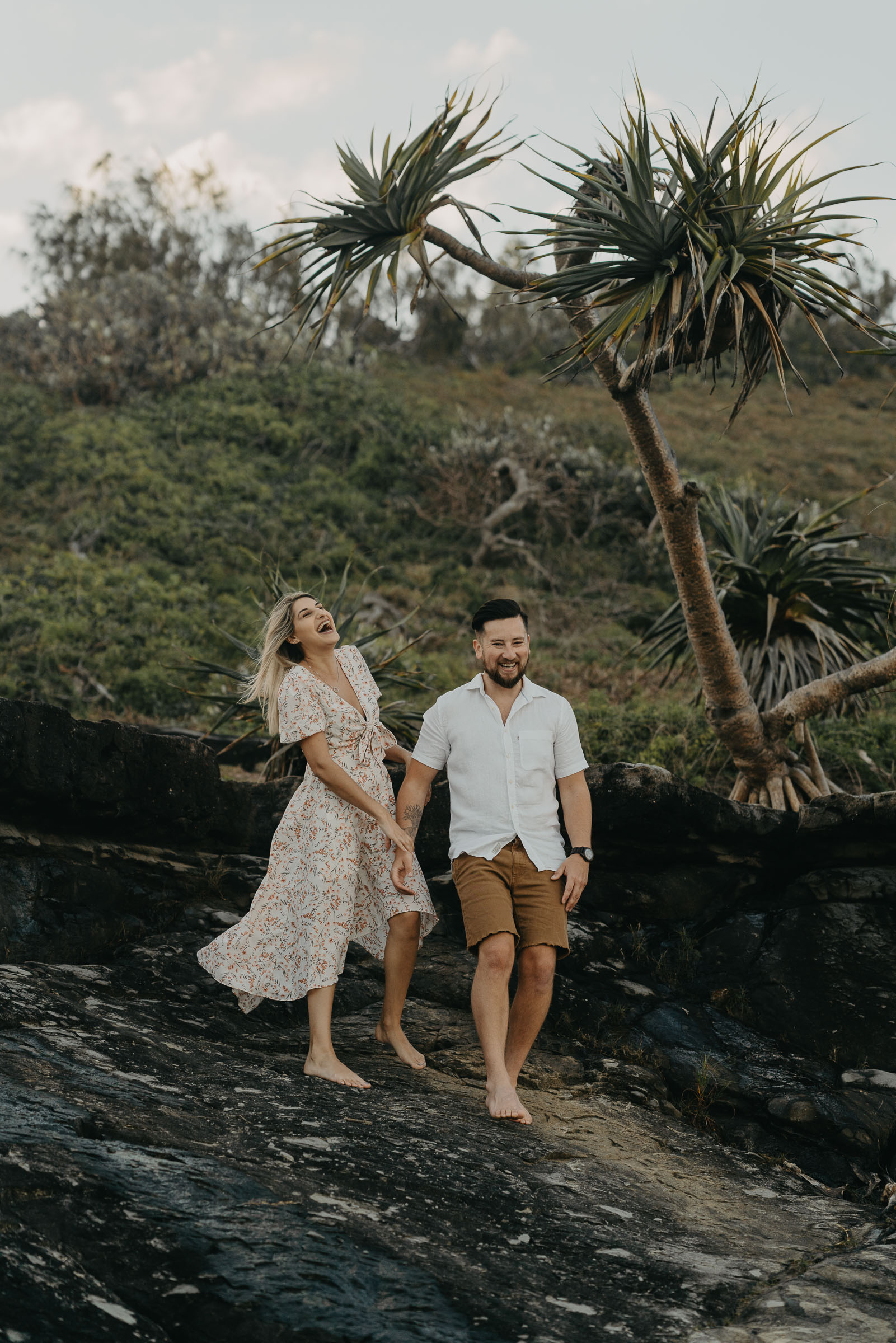 A couple visiting Point cartwright light during winter